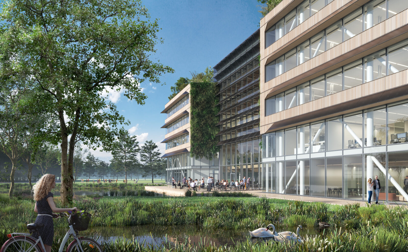 Corner view of Plus Ultra Utrecht where it shows the entrance and greenery surrounding it.